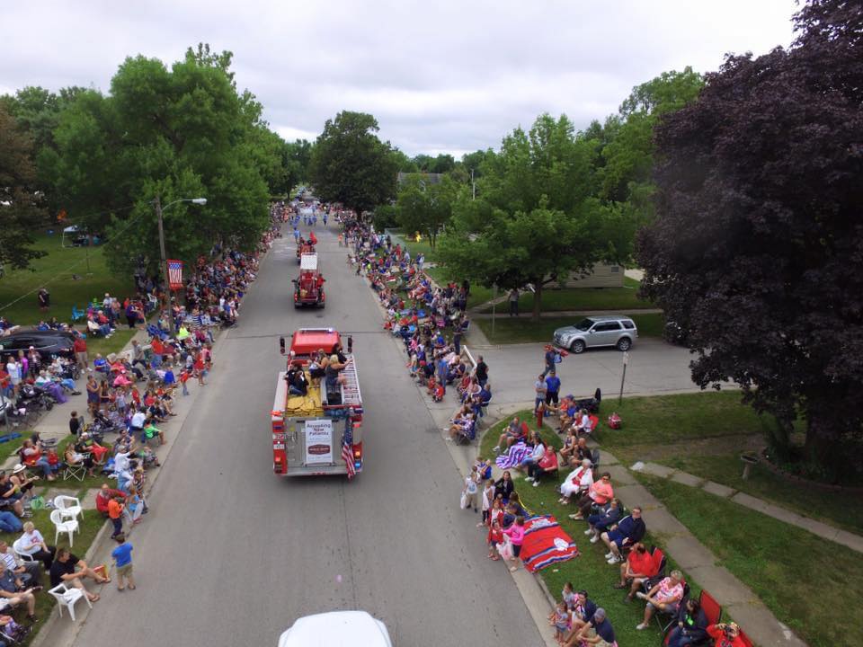 Overhead view of parade going down street
